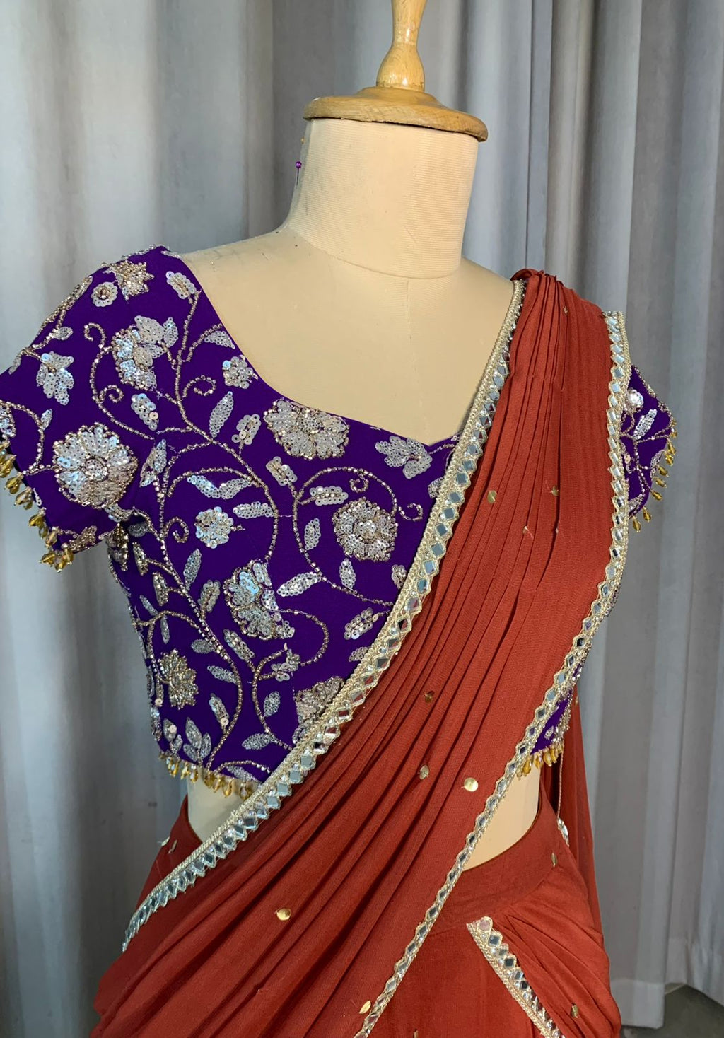 Rust Orange Draped Lehenga Set with Purple Embroidered Blouse
