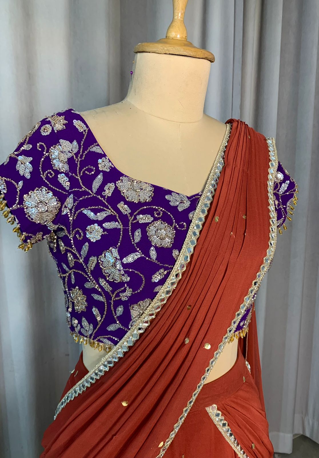 Rust Orange Draped Lehenga Set with Purple Embroidered Blouse