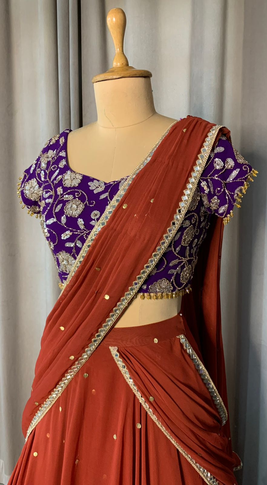 Rust Orange Draped Lehenga Set with Purple Embroidered Blouse