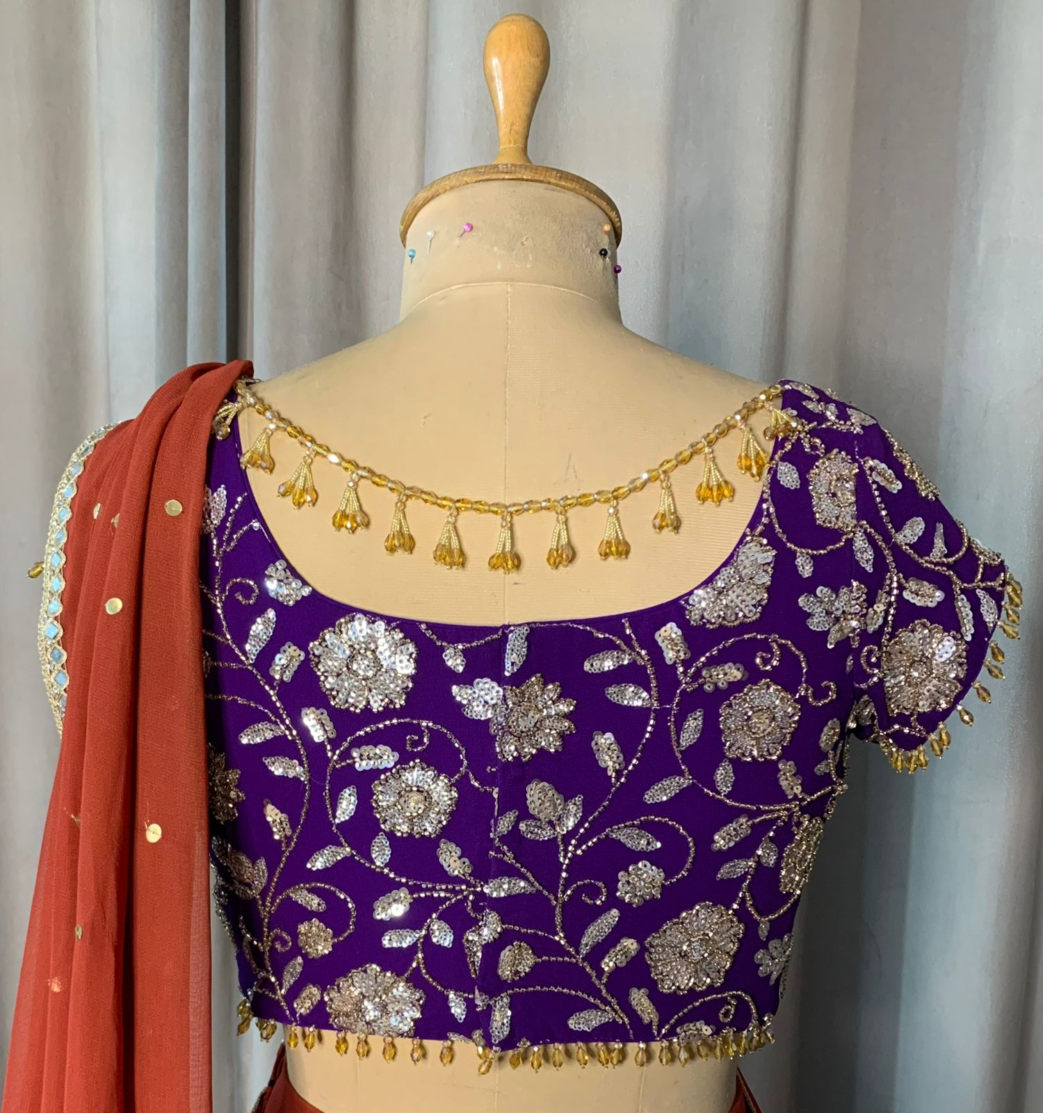 Rust Orange Draped Lehenga Set with Purple Embroidered Blouse