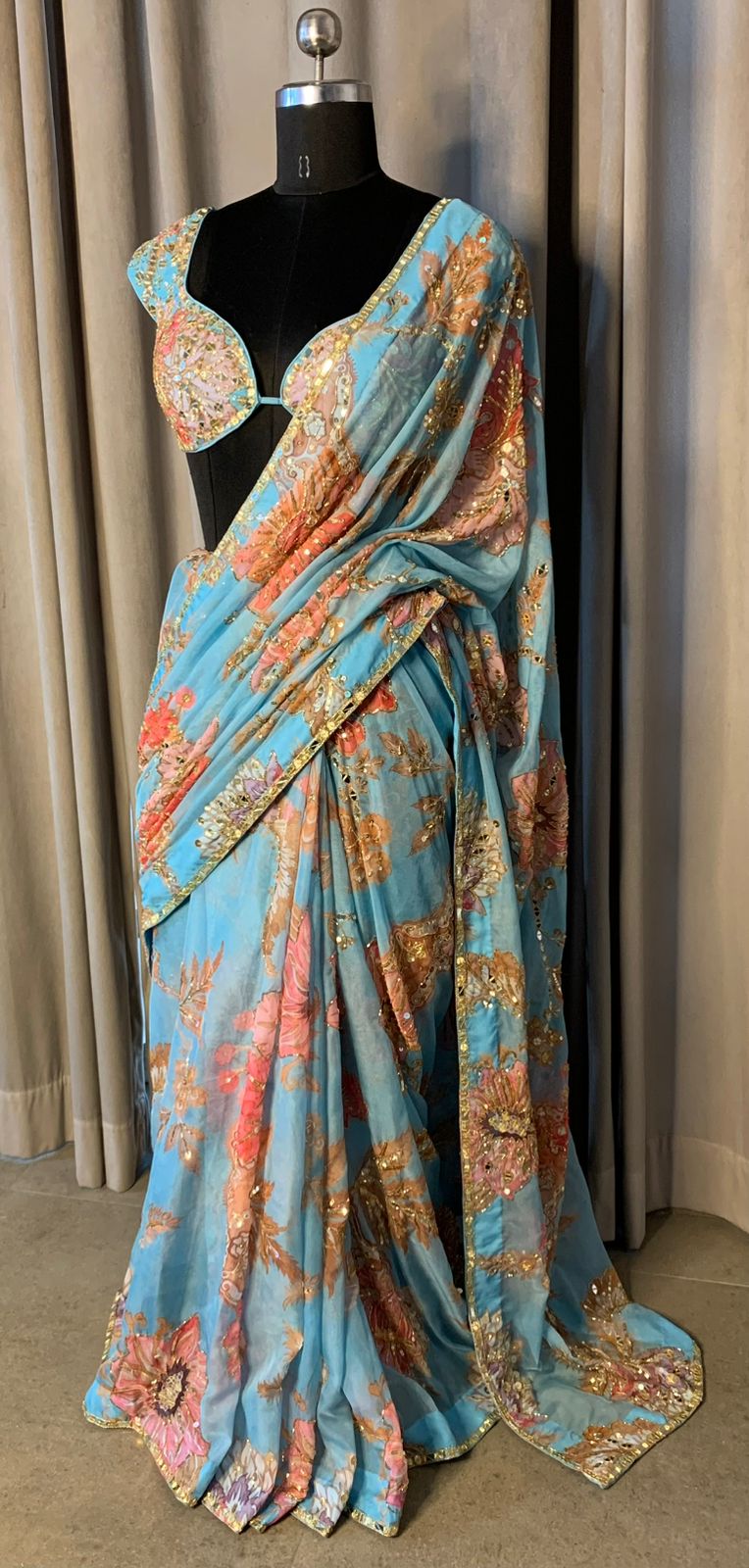 Aqua Blue Floral Organza Saree with Embroidered Blouse